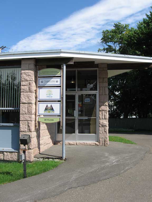 Colour photograph of modern building with stone exterior facing blocks