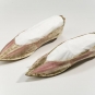 Colour image of pink and brown shoes with pointed toes and low heels